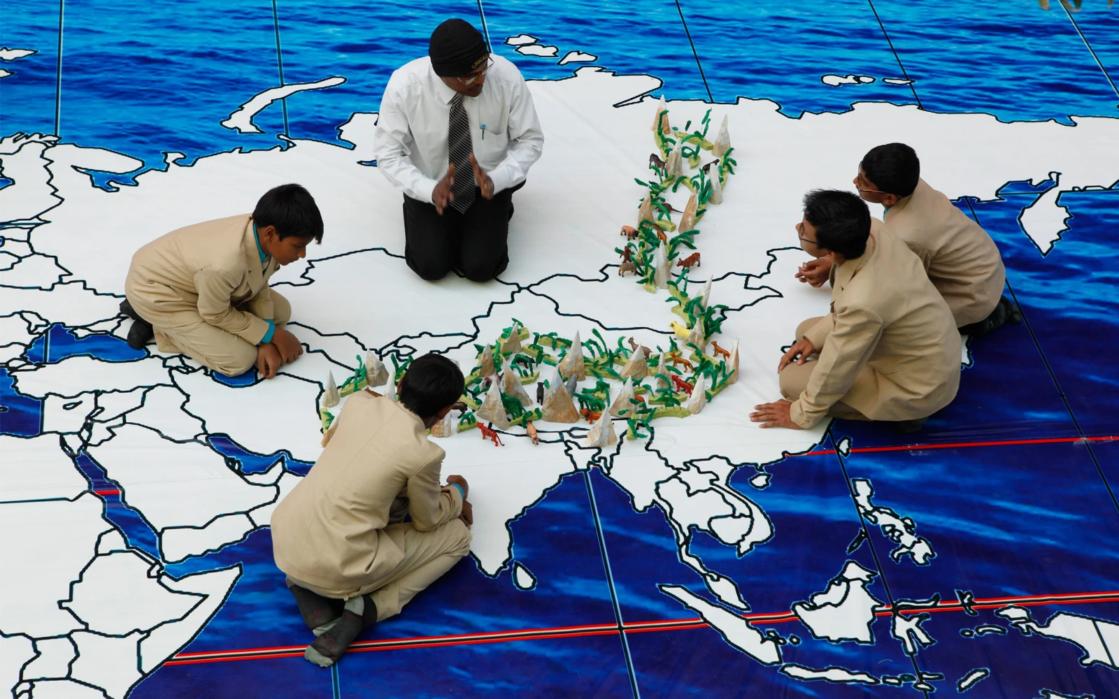 Abhyasa School receiving academic excellence award at ceremony